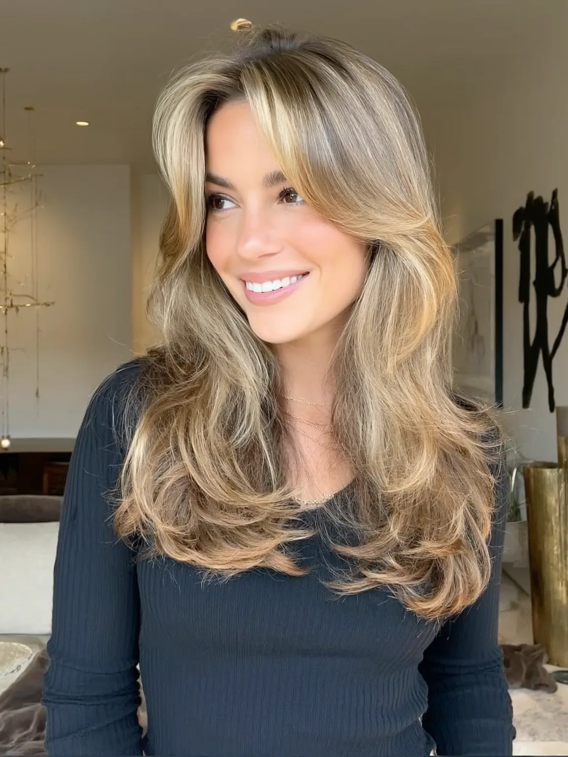 Long Layered Cut with Glossy Sandy Blonde Balayage